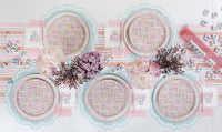 A full Chic Mahjong Game Night tablescape featuring mahjong tiles, floral arrangements, and Mahjong Cocktail Napkins.