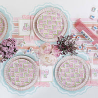 Overhead view of a Mahjong Party Supplies setup featuring plates, tiles, and a striped runner.