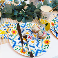 Mediterranean table setting with La Dolce Vita napkins and lemon decor