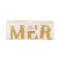 Merry Christmas glitter banner in retail packaging