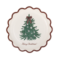 Cream paper plate with a green Christmas tree, gingham bow, and red Merry Christmas script inside a wavy red scalloped edge