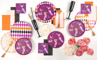 Overhead flat lay of the Midnight Spirits Halloween collection with plates, cocktail napkins, cups, a black paper fan, and pink flowers