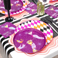 Purple Midnight Spirits Halloween plate with the martini cocktail design, pink scalloped charger, purple harlequin pattern, and black cutlery