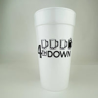 Close front view of white foam cup showing 4th DOWN text and mug icons.