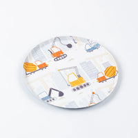 Single construction dessert plate on white background with city icons.