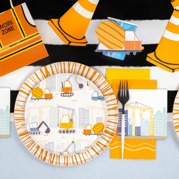 Place setting with construction plate and square crane napkin beside a fork.