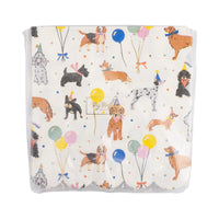 Front of sealed napkin pack displaying the dog party design.