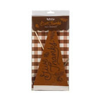 Close view of the brown felt Give Thanks pennant in a clear sleeve over a brown gingham backer.