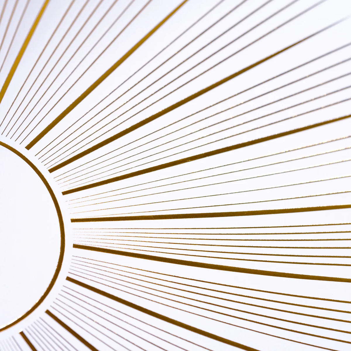 Close crop of gold starburst rays radiating from the center.
