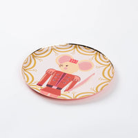 Single Mouse King dessert plate on blush pink with gold curtain border.
