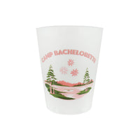 Close-up of frosted pink Camp Bachelorette flex cup with lake postcard graphic