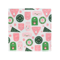 Flat-lay photo of Camp Bachelorette large napkin showing pink and green camp-patch design