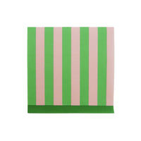 Isolated view of pink and green striped cocktail napkin
