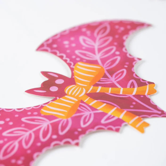 Close up of pink bat with yellow striped bow from the Bats and Bows accent sticker set.