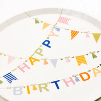 Macro of the word Happy on the bunting with striped and solid flag details.
