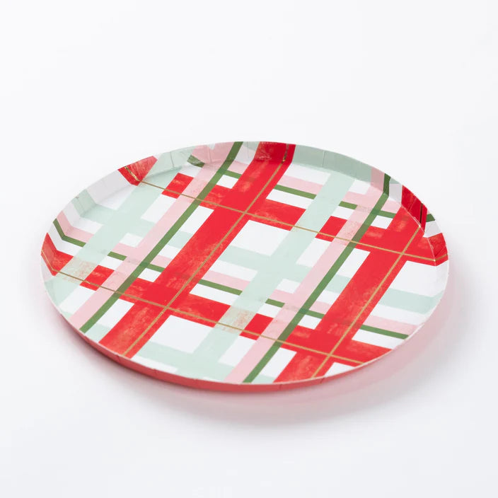 Three-quarter view of a single cheerful plaid small plate on white background.