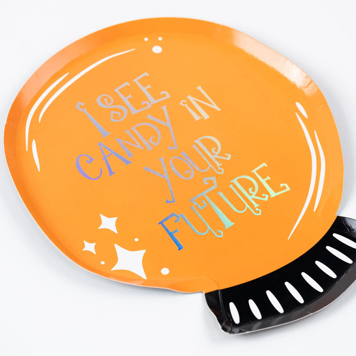Angled view of the die cut crystal ball plate showing the black stand graphic at the base.