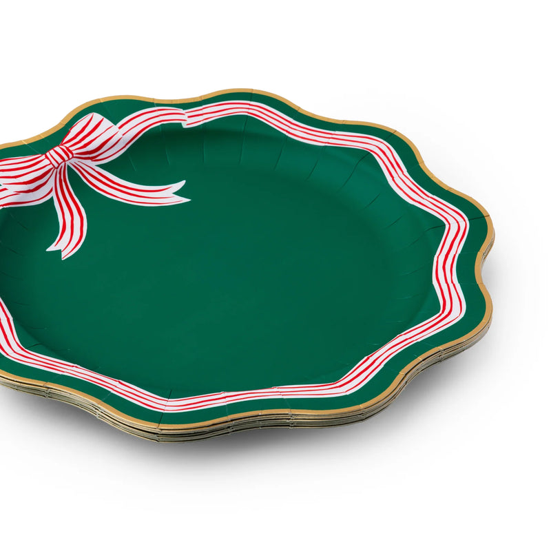 Side stack showing scalloped rim detail on green holiday dinner plates green paper plates