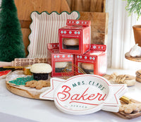 Holiday counter display with stacked oven boxes from Mrs Claus' bakery