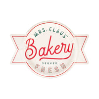 Single “Mrs. Claus’ Bakery” shaped dessert plate, cream with festive red and green text