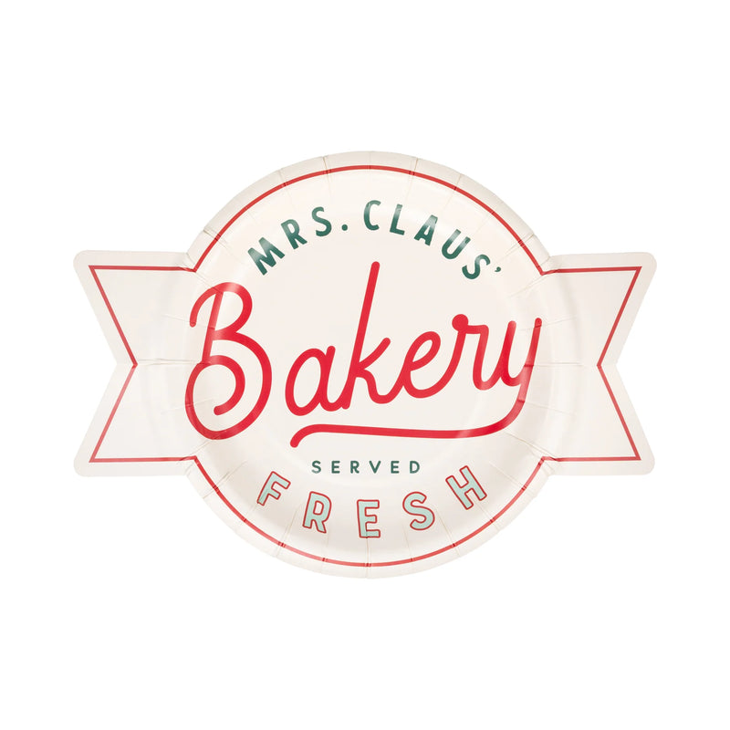 Single “Mrs. Claus’ Bakery” shaped dessert plate, cream with festive red and green text