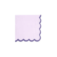 Single lilac cocktail napkin with dark purple scalloped border on white background.