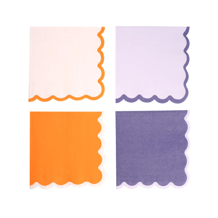 Grid of four cocktail napkins showing all color options with scalloped edges.