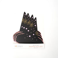 Retail pack showing eight black witch’s hat cardstock napkin holders with pink dots and gold web accents.