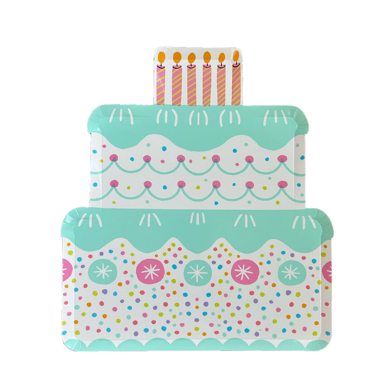 Single tiered-cake die-cut paper plate with mint frosting, sprinkles, and candle topper on white background