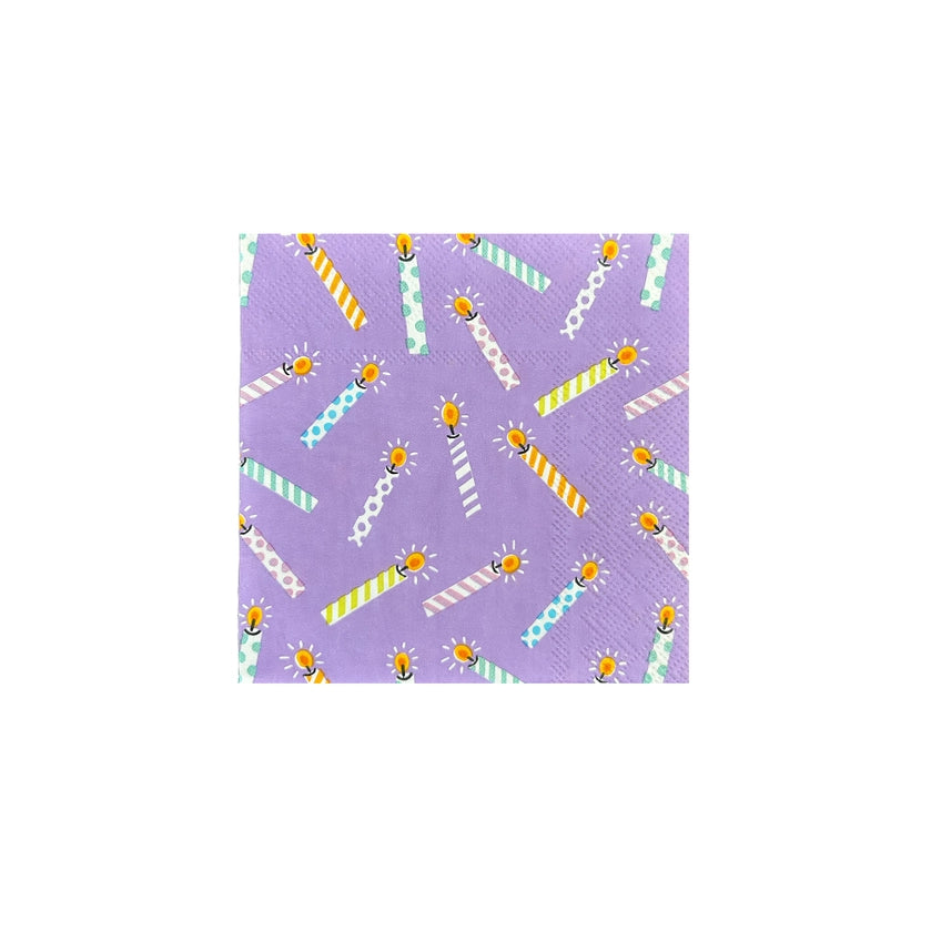 Lilac cocktail napkin covered in multicolor striped birthday candles, perfect accent for versatile birthday party ideas