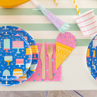 Four 7.5-inch party blowers in pink, lime, blue, and lilac prints with fringe tails, lined up on white background