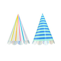 Studio image of two cone party hats—one rainbow striped, one blue striped—showing iridescent scallop bases against white background