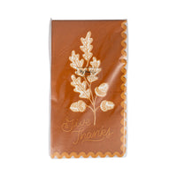 Back of package showing rust acorn and oak leaf dinner napkin design