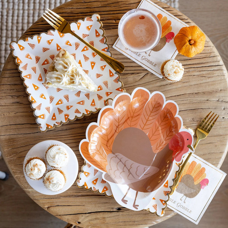 Fall dessert table styled with turkey bowl and Thanksgiving napkins
