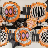 Overhead runner with pumpkins, plates, and orange stripe guest towels
