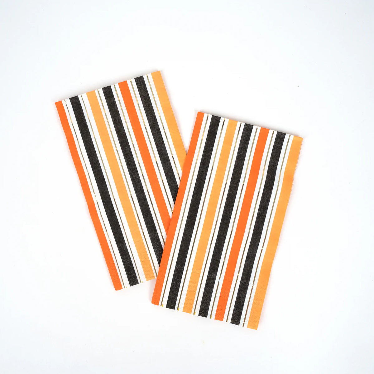 Two orange stripe halloween napkins shown flat on white