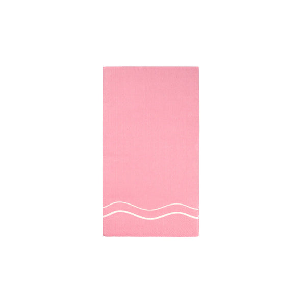 Single pink color block guest towel with white wavy trim on white background