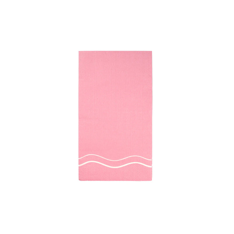 Single pink color block guest towel with white wavy trim on white background