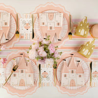 Long tablescape styled with castle plates and carriage princess napkins