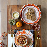 Tablescape with pumpkin round dessert plate and cookies