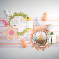 Pastel tablescape showing scalloped paper cocktail napkins in fall colors beside plates, perfect fall napkins