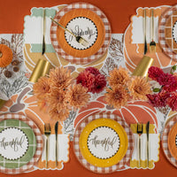 Thankful dinner table using scalloped thanksgiving napkins at each setting