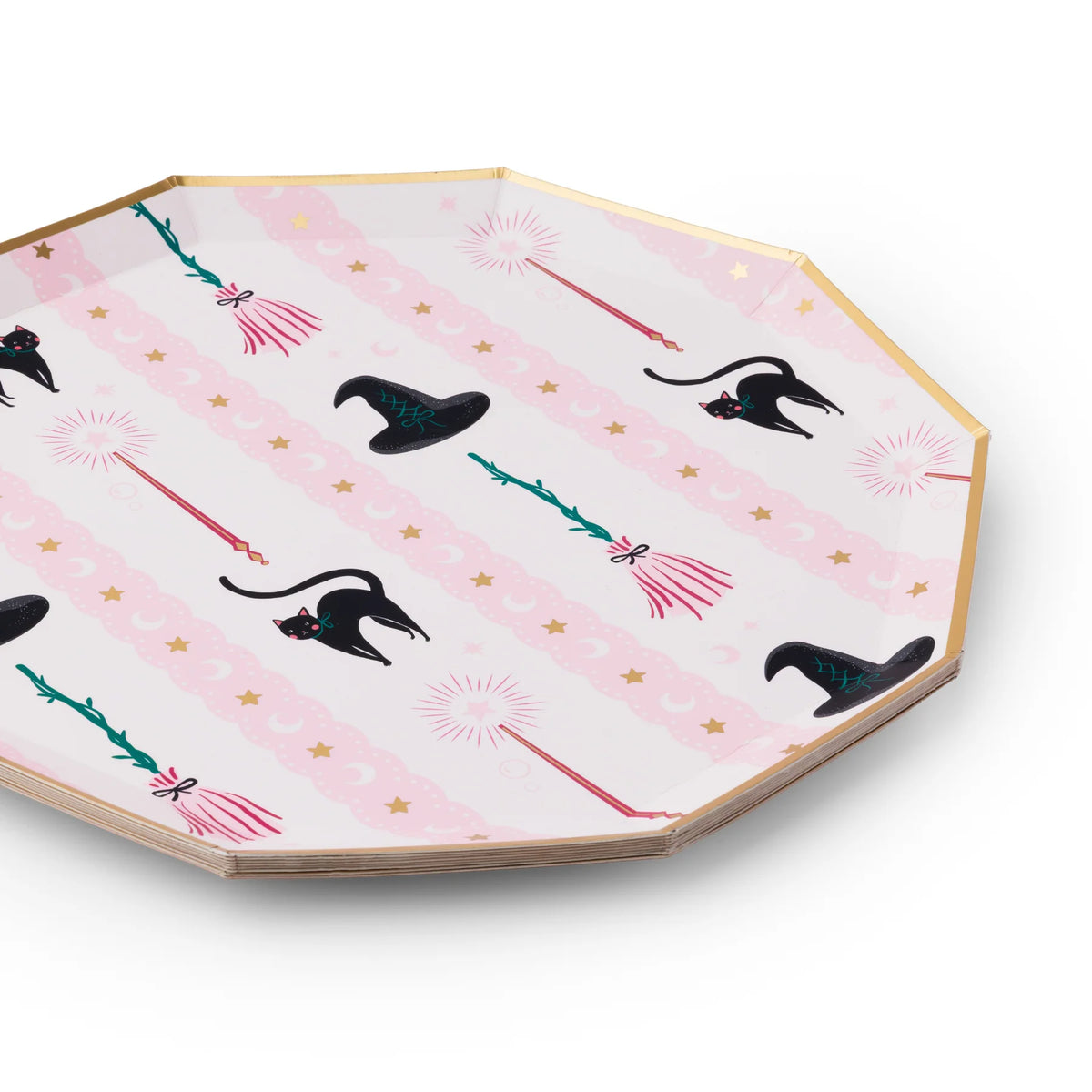 Paper plate with witch hat and broomstick pattern on a white background