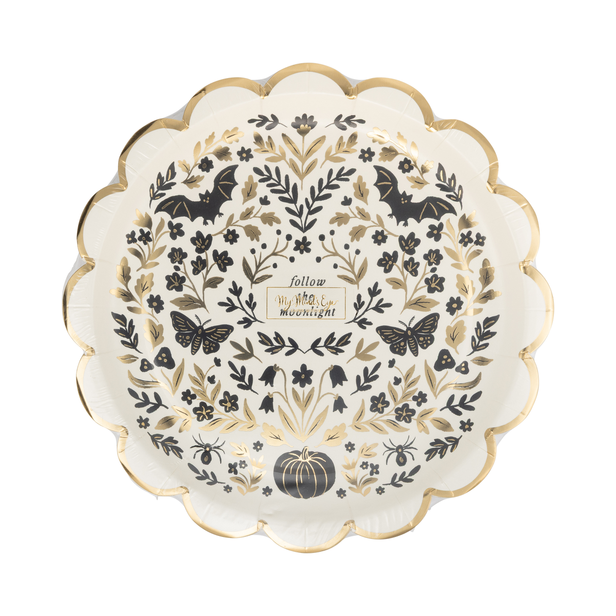 Angled overhead of the Moonlight Halloween plate showing the full symmetrical folk-art moth and botanical illustration and gold foil scalloped edge.