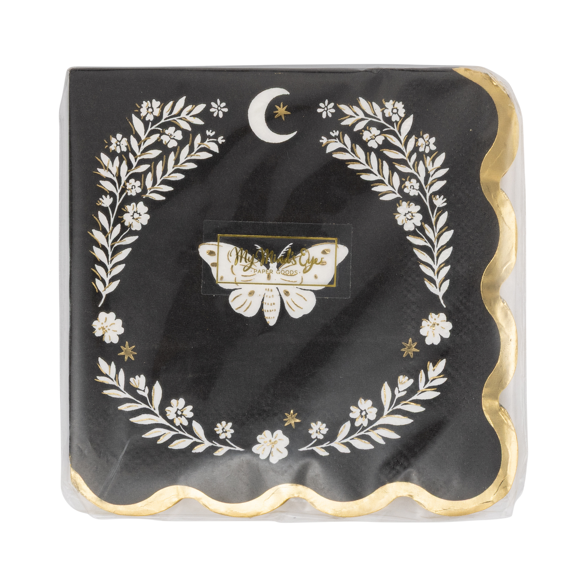 Close-up of the moth cocktail napkin showing the cream moth, laurel wreath, crescent moon, and gold foil scalloped edge detail on the black base.