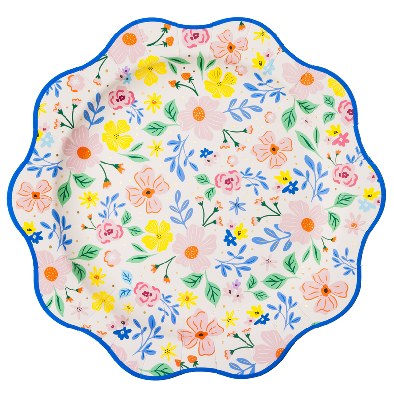 Multicolor floral dinner plate with scalloped edges and blue border.
