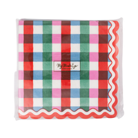 Pack of multicolor gingham paper cocktail napkins with wavy red and cream edge