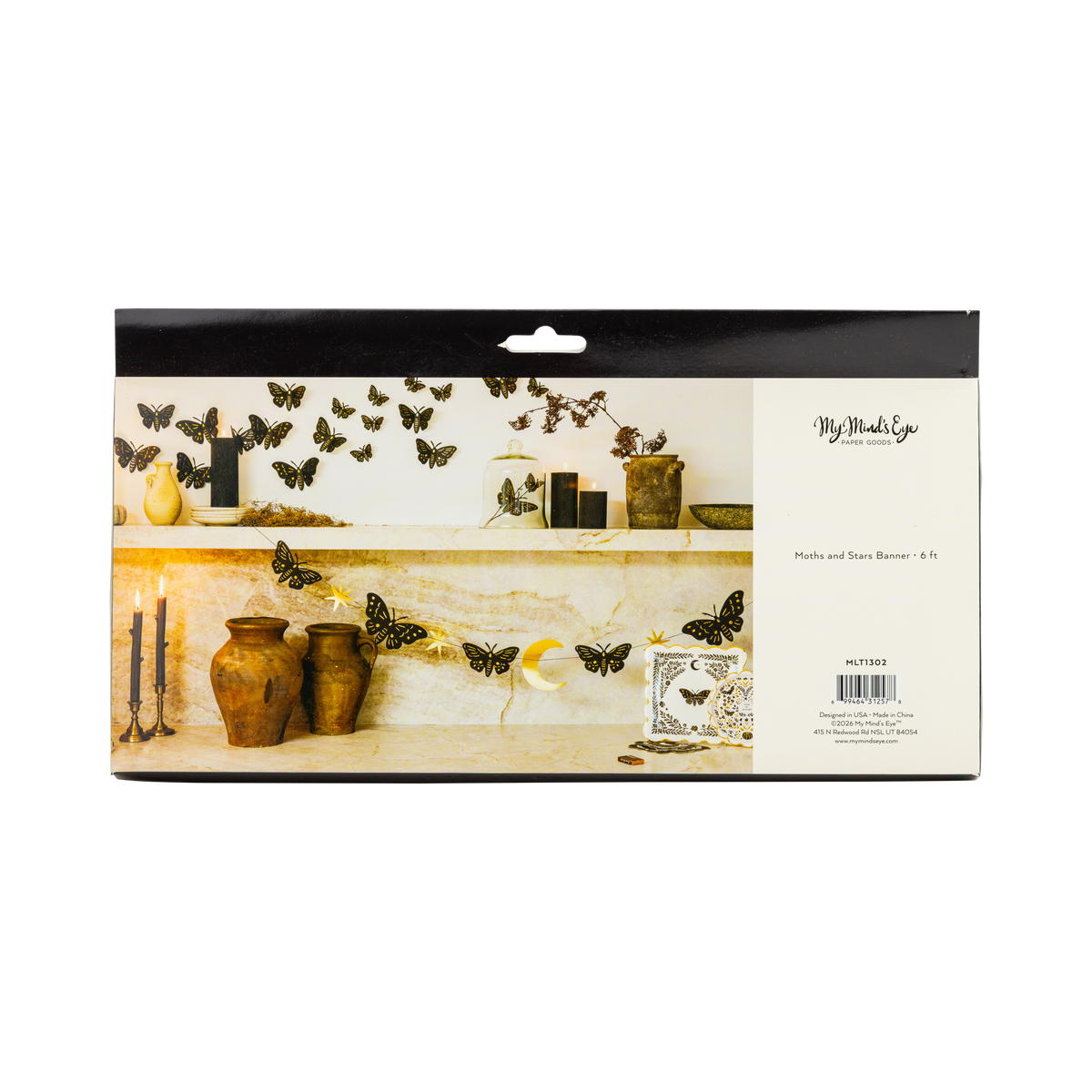 Back packaging view of My Mind's Eye Moonlight Moths and Stars paper banner showing product details and styled mantel imagery.