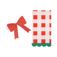 Components of the napkin set: the folded paper napkins and the separate red bow band.