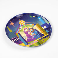 Angled plate showing Holy Family scene with radiant star
